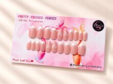 Blush Bow press-on nails by The Belle Coats, twenty nails on a card