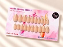 Golden Dust press-on nails by The Belle Coats, twenty nails on a card